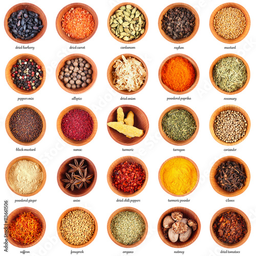 Fototapeta Naklejka Na Ścianę i Meble -  Large collection of different spices and herbs in wooden bowls, isolated on white background