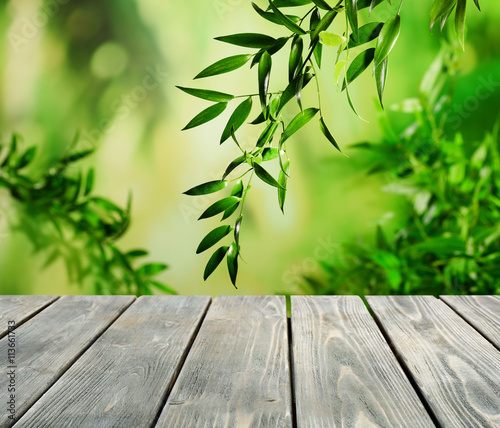 Abstract nature bokeh background and empty wood table