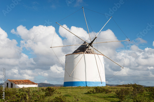 Traditional portuguese windmill near Odeceixe Aljezur in springtime, Algarve, Portugal