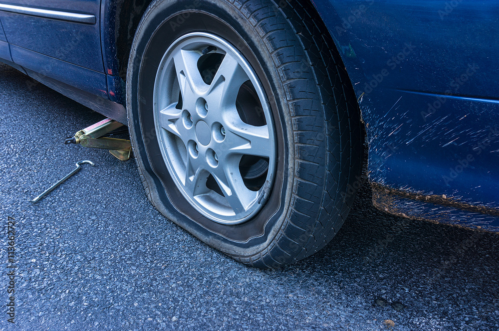 Flat tire on the road