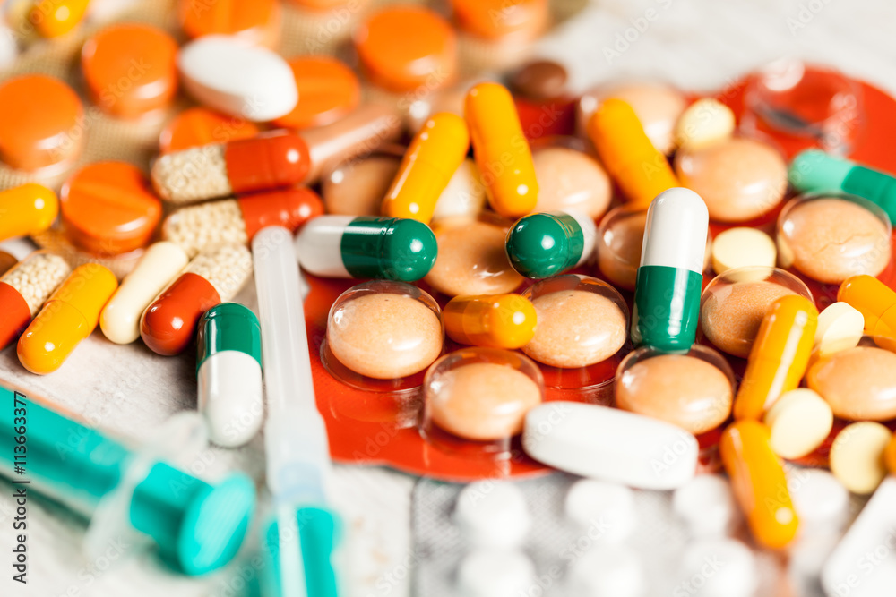 Pills and drugs. Colorful pills and drugs in close up photo Pills and drugs. Colorful pills and drugs in close up photo