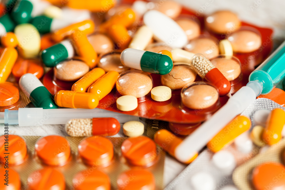 Medicine prescription. Pills and antibiotic in blurred backgroun