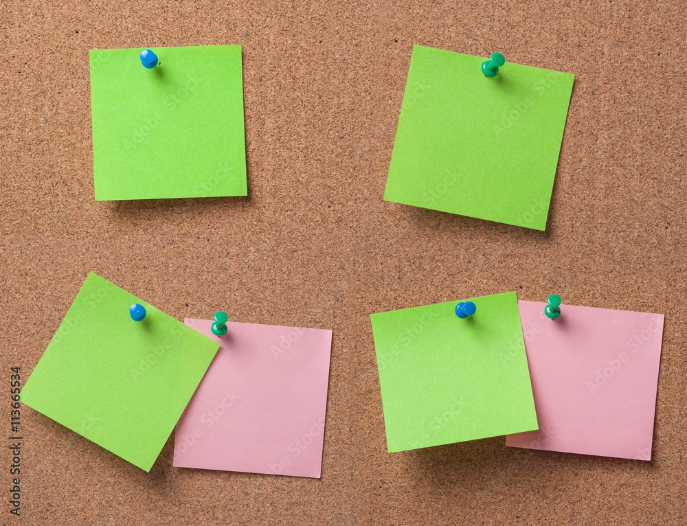 note paper with push pins on cork board ready for your text. note paper with push pins on cork board ready for your text.