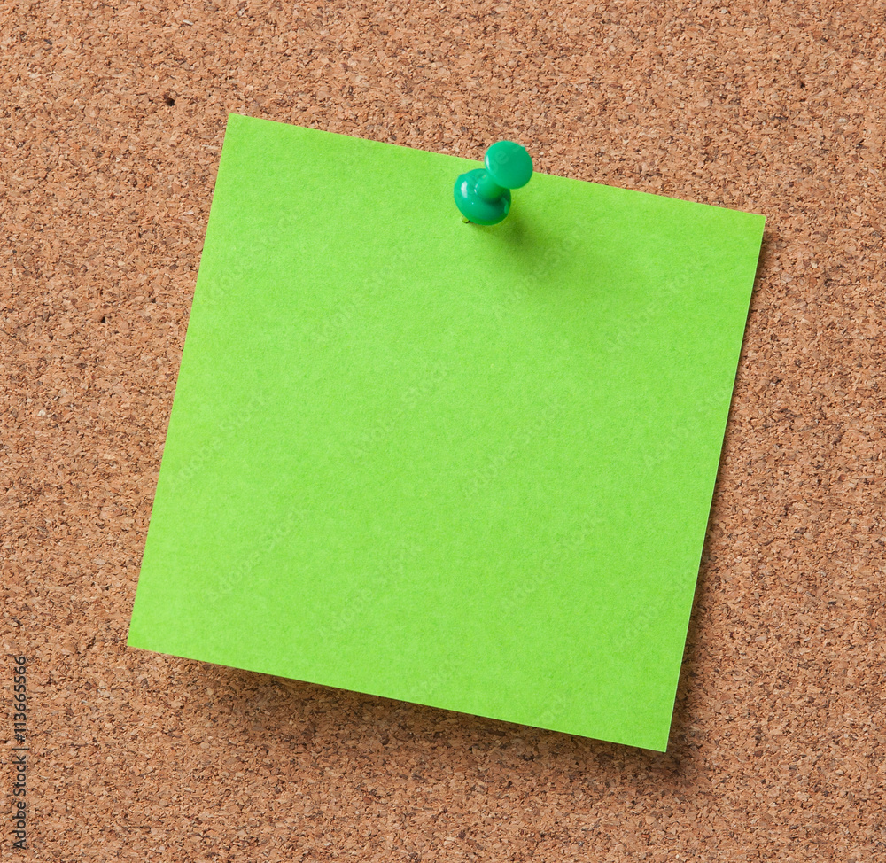 note paper with push pins on cork board ready for your text. note paper with push pins on cork board ready for your text.
