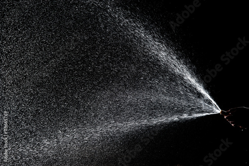 Tableau sur toile Water splashes on black  background