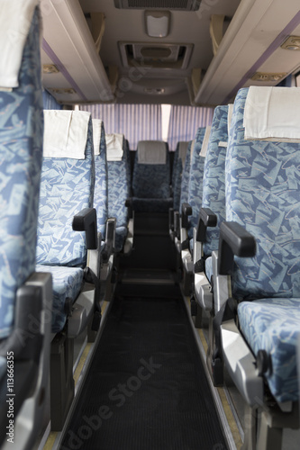 blue fabric vehicle seat on bus