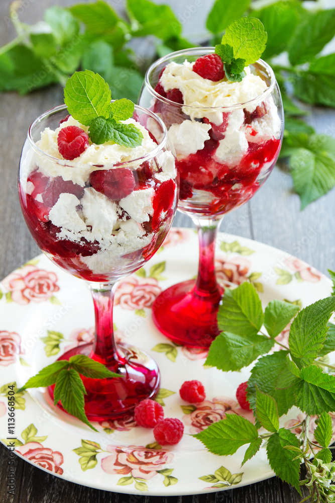 Eton mess - dessert with raspberries. Eton mess - dessert with raspberries.