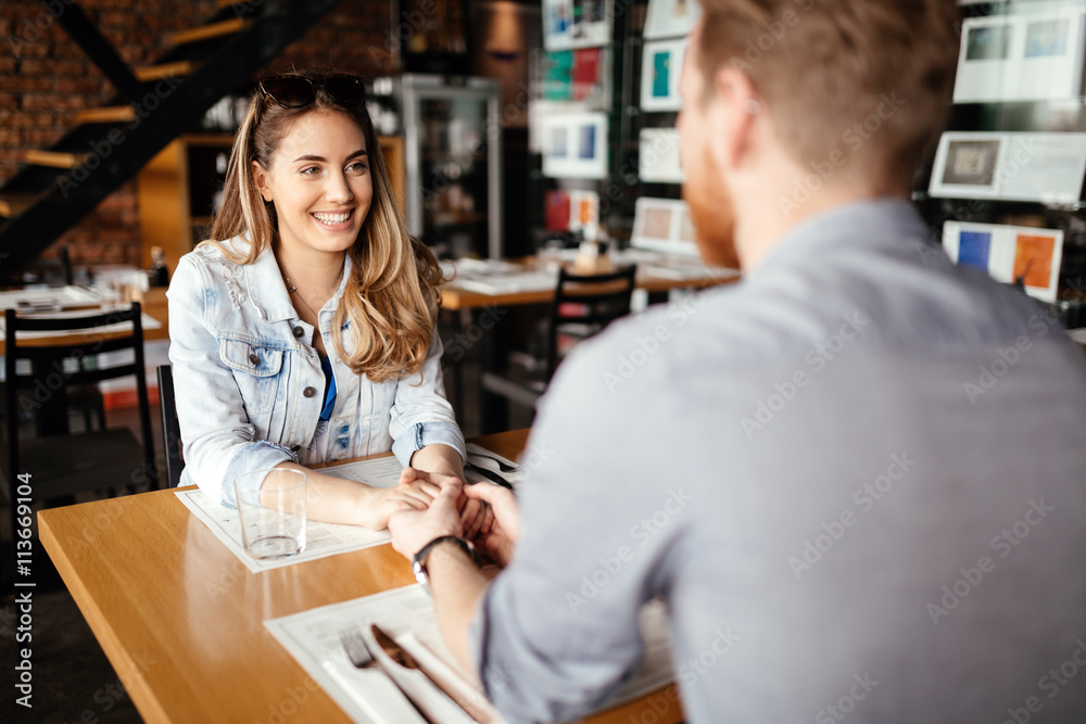 Couple dating in restaurant