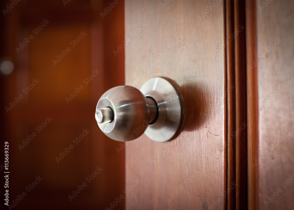 door handle keyhole with old design on brown wood door door handle keyhole with old design on brown wood door
