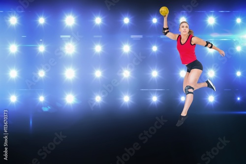 Composite image of female athlete with elbow pad throwing handball © vectorfusionart