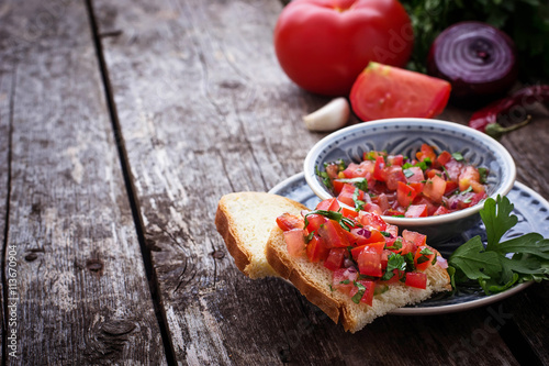 Mexican tomato salsa sauce and toasts