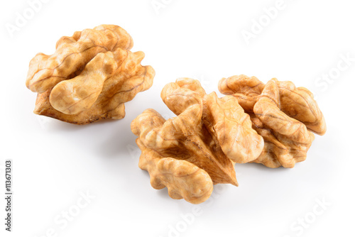 Walnut kernels isolated on white background.