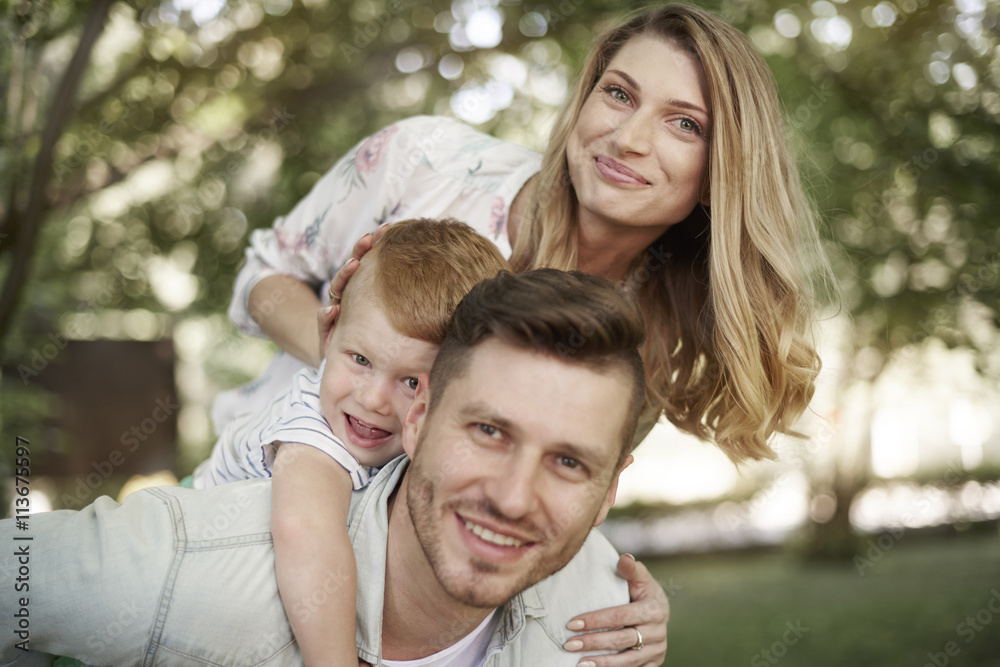 Portrait of happy family at the garden