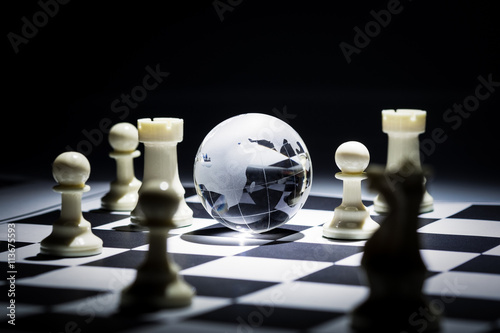 Glass globe on chess board