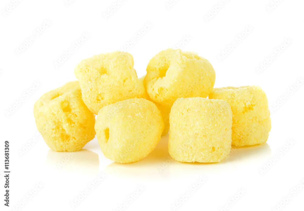 Crunchy corn snacks on a white background