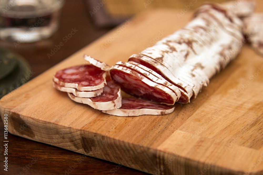 Delicious and tasty meat dishes. Ham, salami, prosciutto. Italian appetizers Delicious and tasty meat dishes. Ham, salami, prosciutto. Italian appetizers