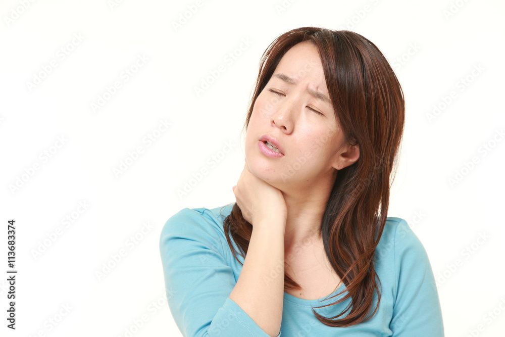 middle aged Japanese woman suffers from neck ache middle aged Japanese woman suffers from neck ache