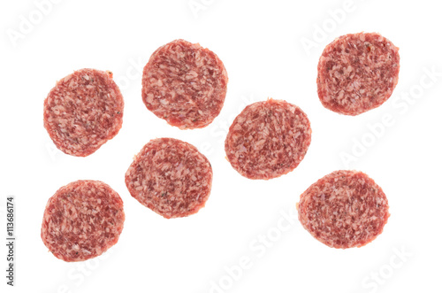 Sausage patties isolated on a white background top view.