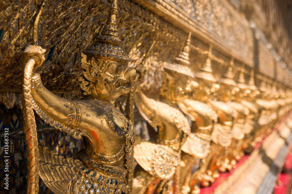 Golden statues in Grand Palace in Bangkok