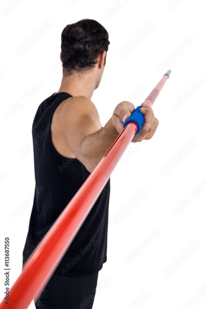 Rear view of athlete male preparing to throw javelin Rear view of athlete male preparing to throw javelin