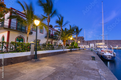 Architecture of Puerto de Mogan at night, a small fishing port on Gran Canaria, Spain.