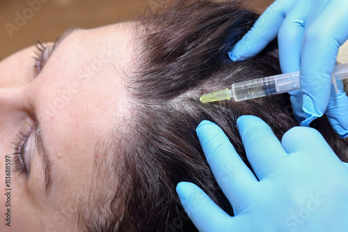 Anti hair loss injection in clinic.