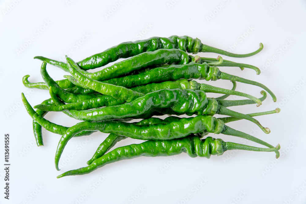 green hot pepper on a white background green hot pepper on a white background