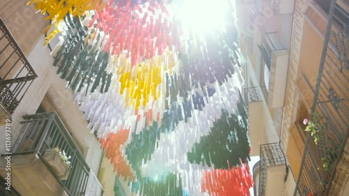 street decoration of gothic district with a cathedral at the end