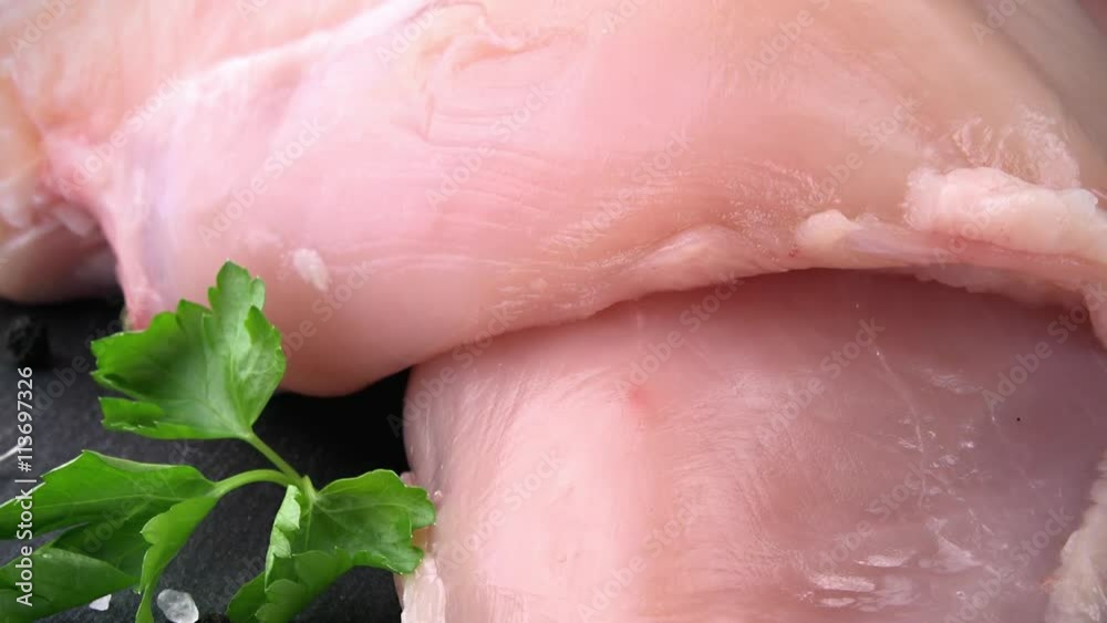 Raw Chicken Fillet as rotating not loopable 4K clip Raw Chicken Fillet as rotating not loopable 4K clip