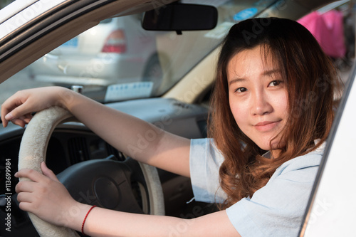 Asian girl in the car © daizuoxin