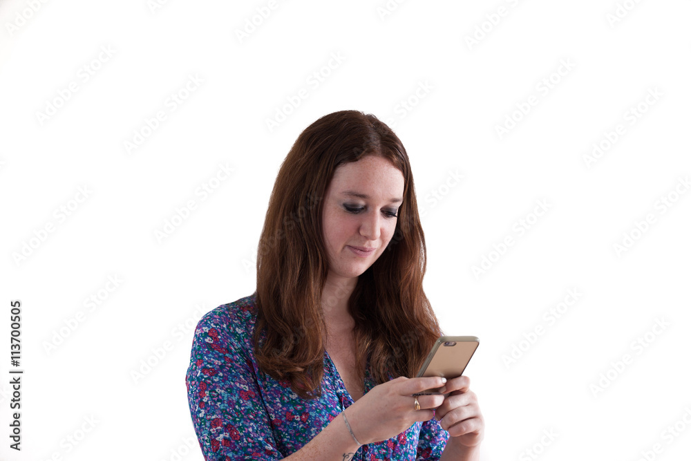 view a young ginger woman at the telephone