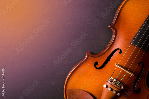 still life of vintage violin on white wooden background