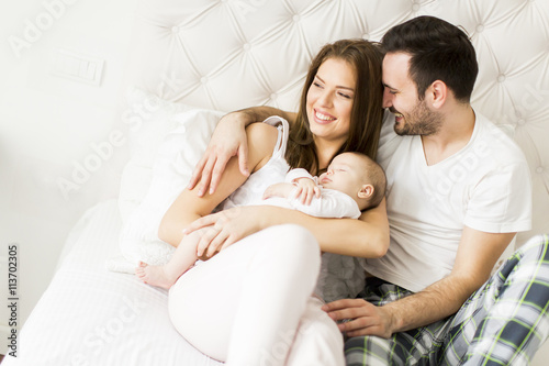 Happy family with newborn baby