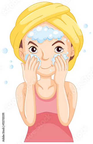 Woman washing face with foam