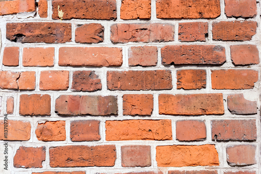 Obraz premium the old red brick city wall
