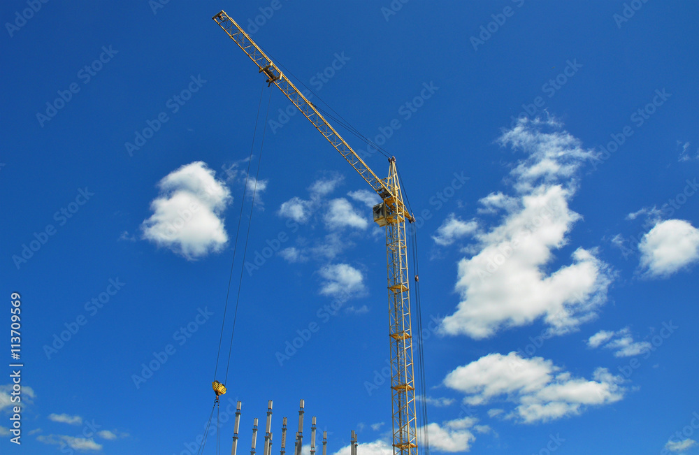 Building crane on construction site. Building high rise. Building crane on construction site. Building high rise.