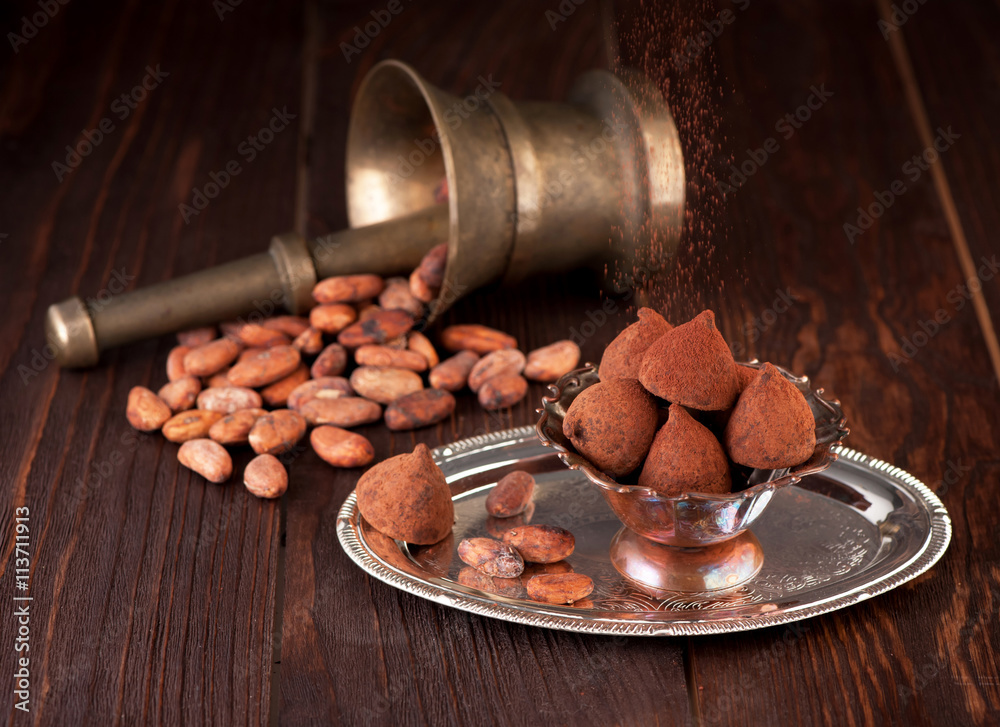 Chocolate truffles and cocoa beans Chocolate truffles and cocoa beans