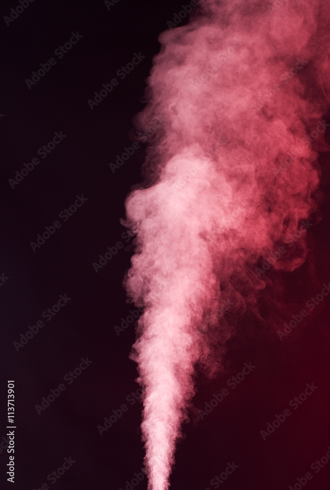 Naklejka premium Red vapor on the black background