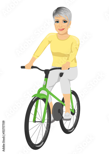 Happy senior woman riding bicycle