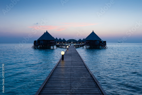 Overwater Bungalow. Ocean in the Maldives. Vacation in luxury hotel