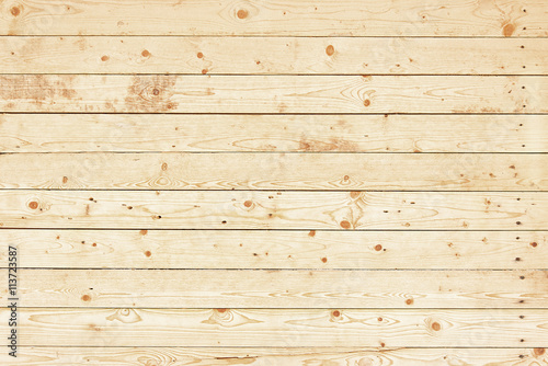 Old light brown wooden fence background texture