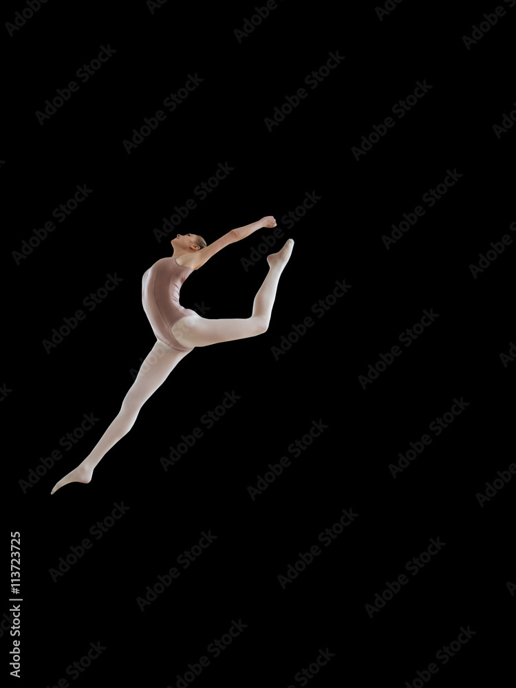 Beautiful ballerina posing in jump on black background