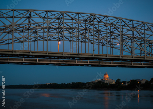 Missouri State Capitol under the bridge crossing the Missouri River in Jefferson City, Missouri © gnagel