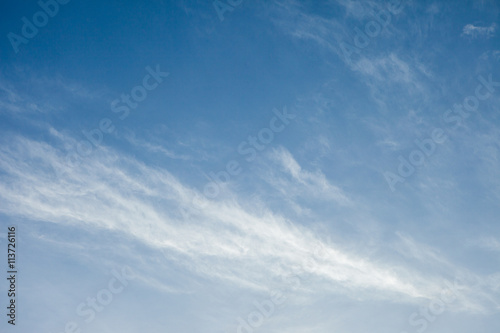 blurred clouds in the blue sky.