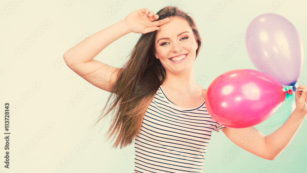 Woman summer joyful girl with colorful balloons Woman summer joyful girl with colorful balloons