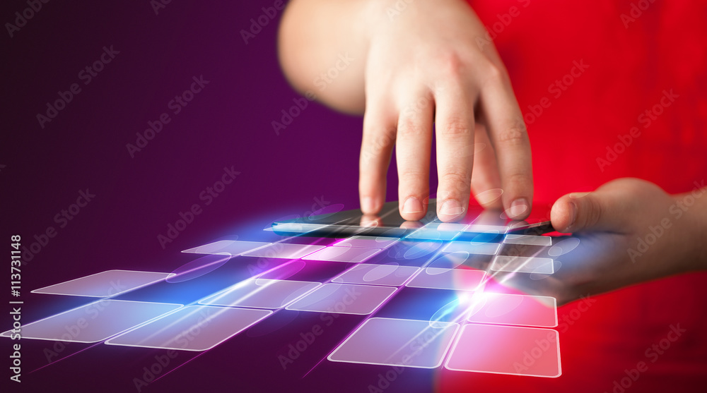 Close up of hand holding tablet with cyber application Close up of hand holding tablet with cyber application