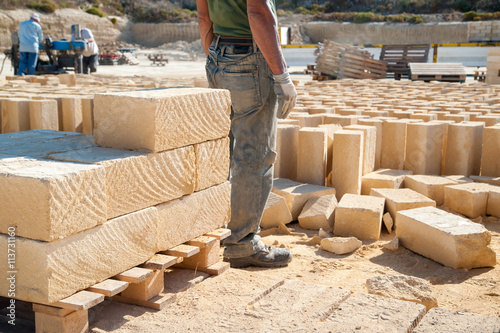 Just cut tufa blocks in a quarry ready to be stocked photo