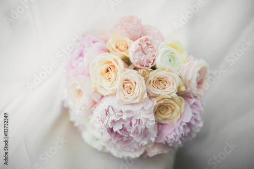 Wonderful luxury wedding bouquet of different flowers