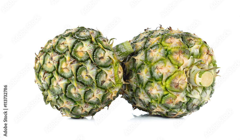 two green pineapples on white bacground two green pineapples on white bacground