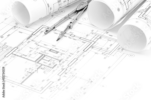 architectural drawings with floor plan, blueprint rolls and draw